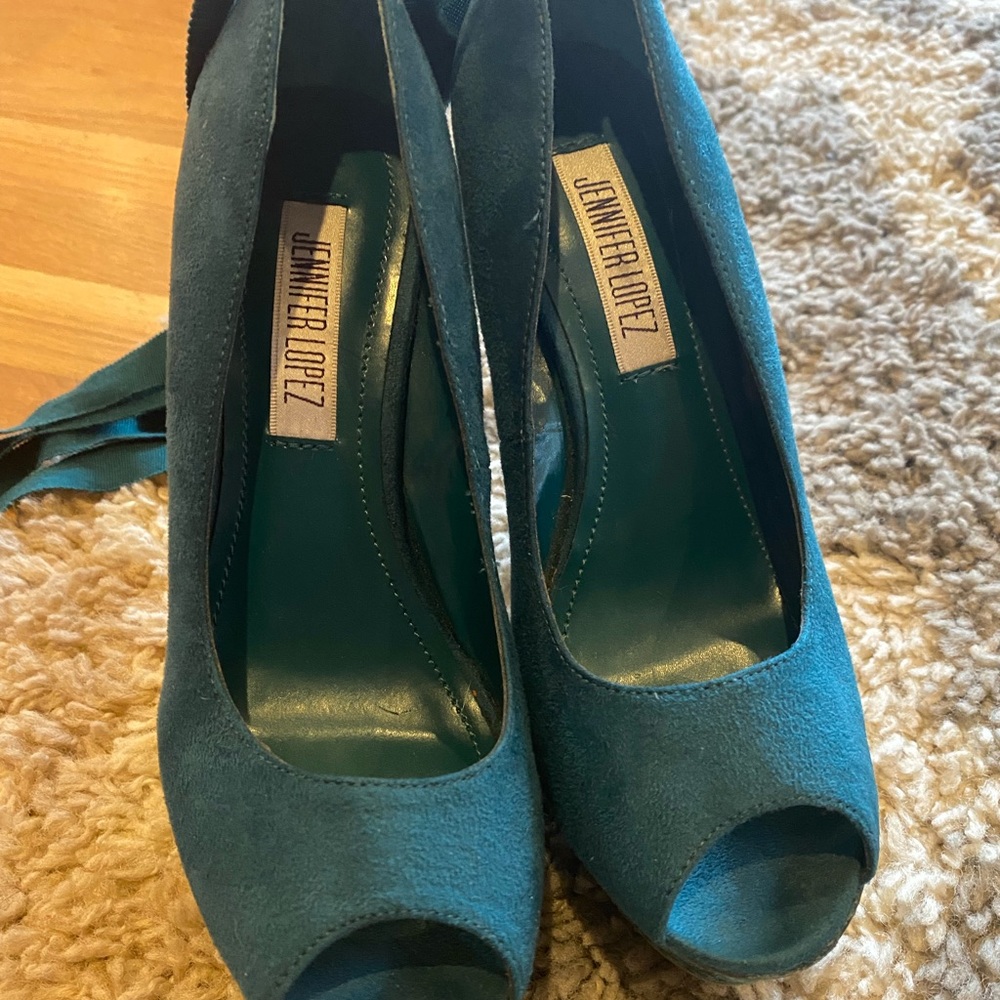 JLO teal and wood platform wedges